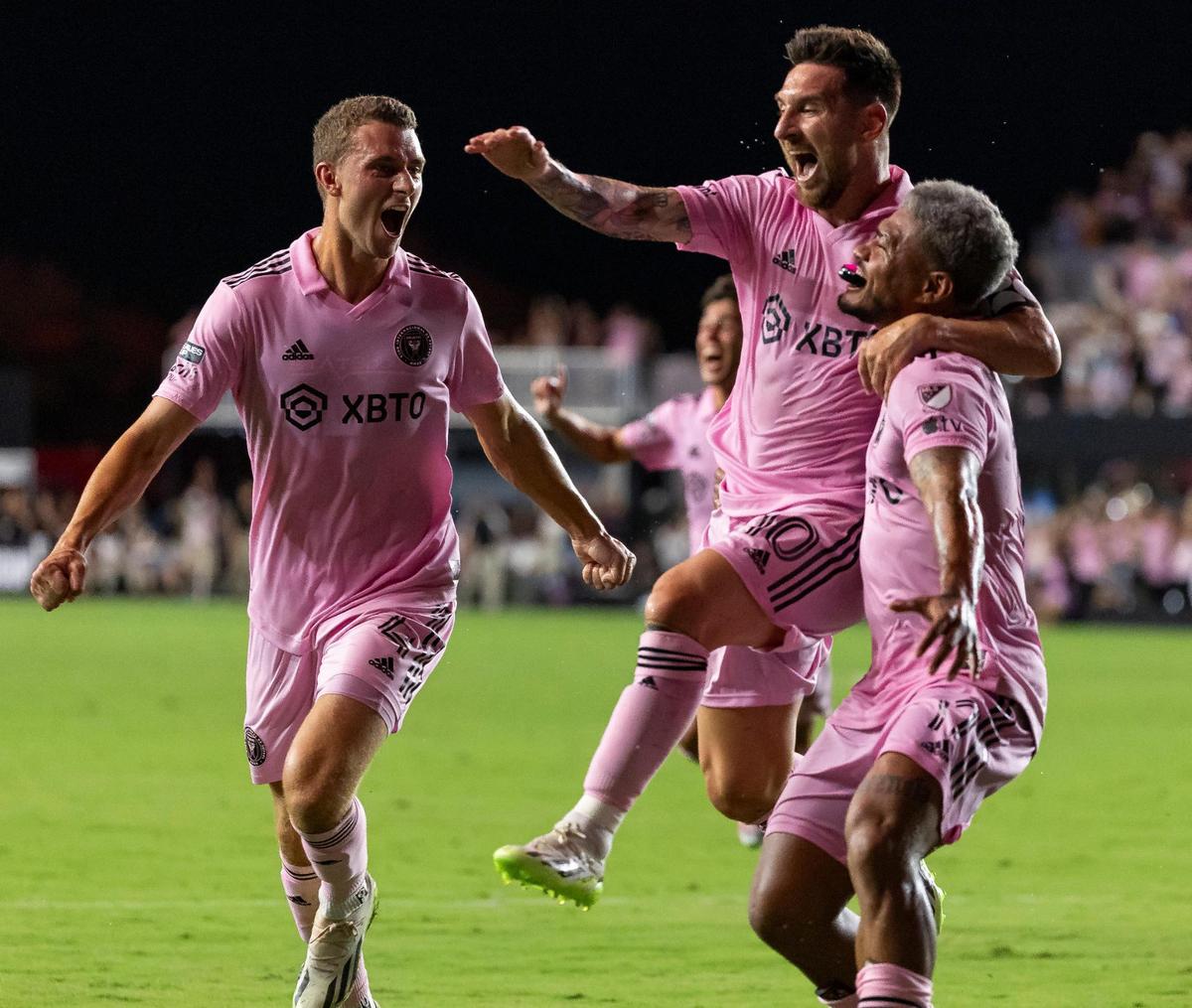 Inter Miami forward Lionel Messi (10) celebrates with Josef Martínez (17) and Christopher McVey (4) in the second half of a Leagues Cup group stage match at DRV PNK Stadium on Friday, July 21, 2023, in Fort Lauderdale, Fla.