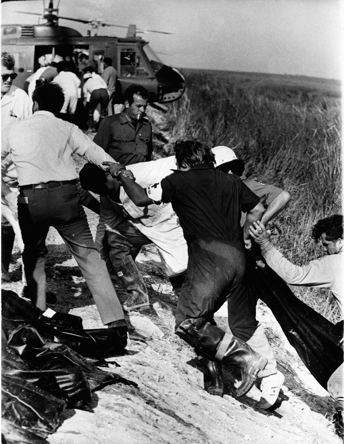 Helicopter and resuce workers at EAL plane crash scene in the Everglades.