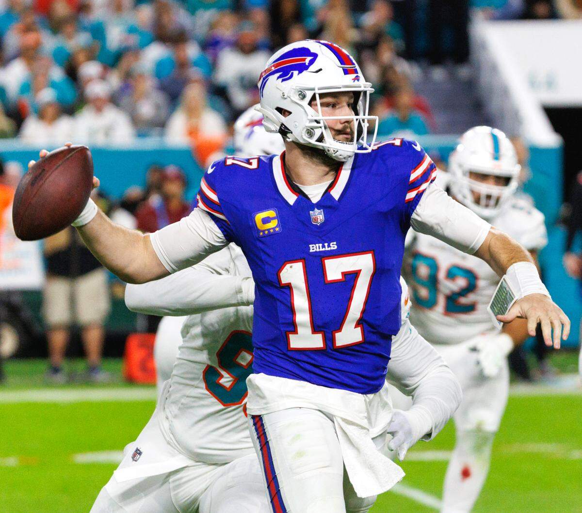 Buffalo Bills quarterback Josh Allen (17) sets up to pass during first half of an NFL football game against the Miami Dolphins at Hard Rock Stadium on Sunday, Jan. 7, 2024 in Miami Gardens, Fl.