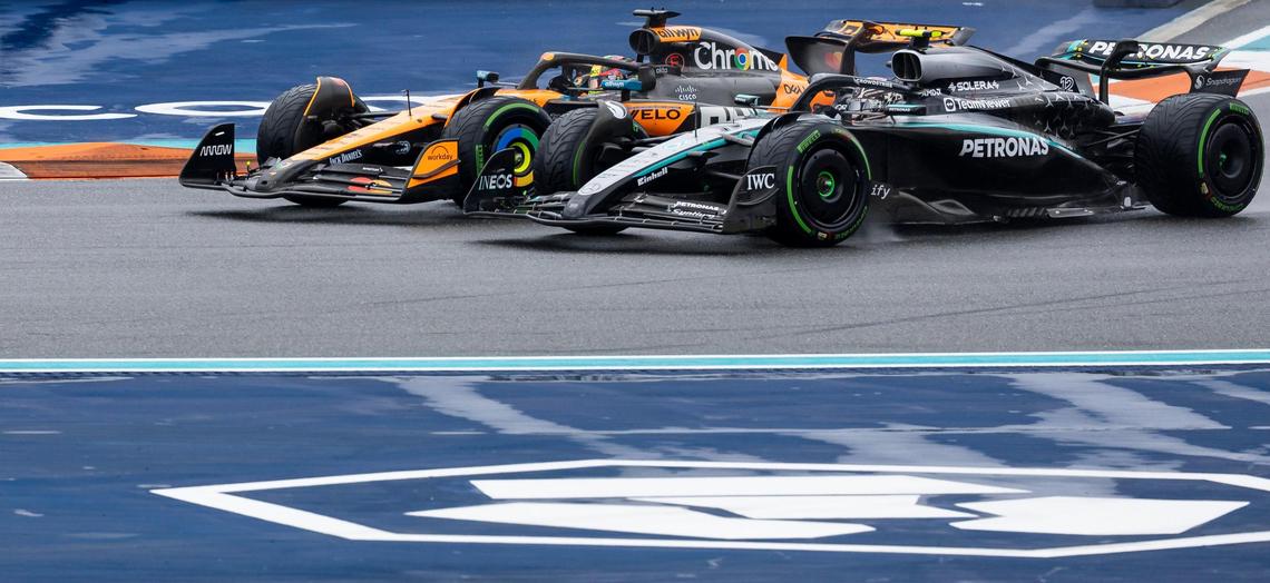 McLaren’s Oscar Piastri of Australia overtakes Mercedes’ Kimi Antonelli of Italy in Turn 1 during the F1 Sprint race on the second day of Formula 1 Miami Grand Prix weekend at the Miami International Autodrome, Saturday, May 3, 2025, in Miami Gardens, Fla.