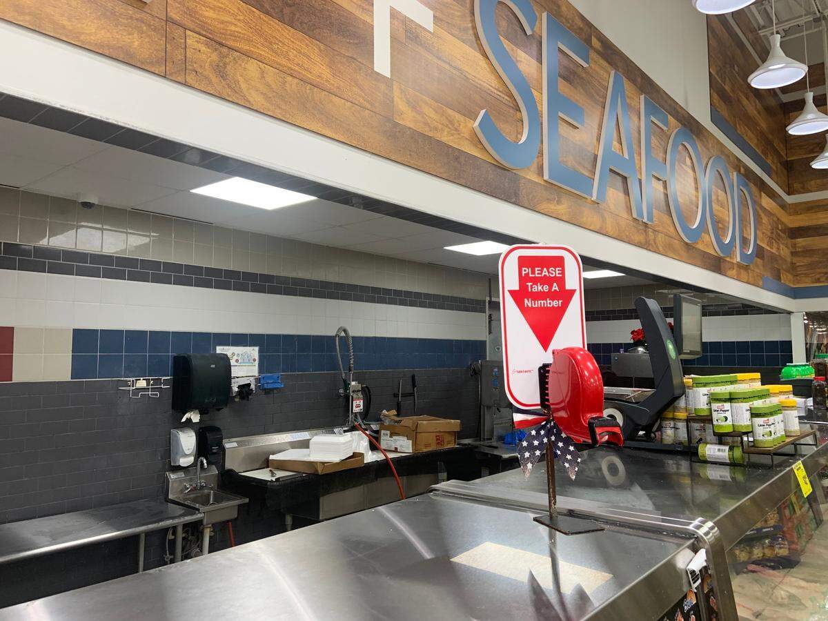 Florida Department of Agriculture Inspector Julio Azpura found problems in the seafood department of this Bravo Supermarket in Florida City.