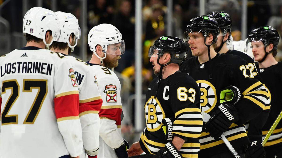 May 17, 2024; Boston, Massachusetts, USA; Florida Panthers center Sam Bennett (9) and Boston Bruins left wing Brad Marchand (63) speak after the Panthers defeated the Bruins in game six of the second round of the 2024 Stanley Cup Playoffs at TD Garden.