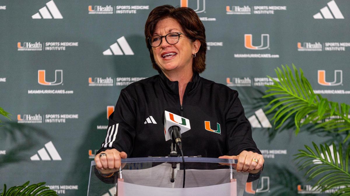 University of Miami Women’s Head Coach Katie Meier laughs as she delivers her retirement speech during a press conference at Watsco Center in Coral Gables on Friday, March 22, 2024.