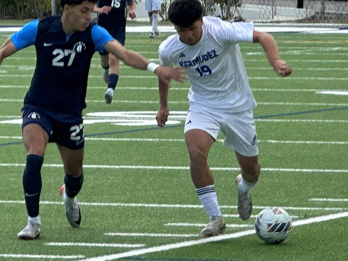 JC Bermudez forward Santiago Figuera (right) dribbles the ball past Gulliver’s Youssef El Zomor (right) early in Tuesday’s Region 4-3A boys’ soccer quarterfinal at Gulliver Prep.