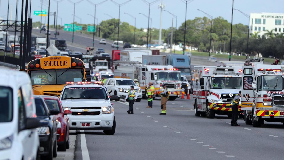 A crash involving at least one school bus and three other vehicles has traffic backed up on eastbound Interstate 595 near the University Drive exit in Davie on Friday, August 3, 2018.