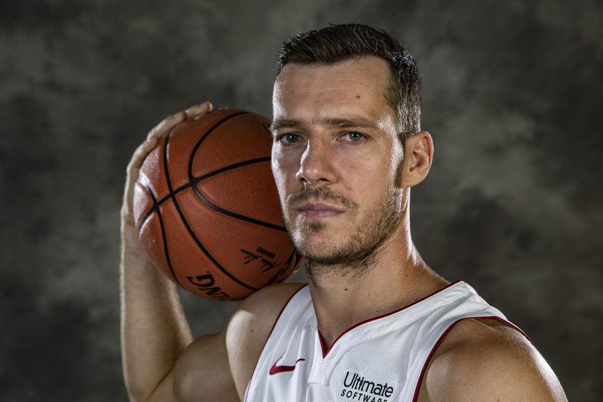 Heat guard Goran Dragic poses for a photograph during media day at American Airlines Arena in Miami on Sept. 30, 2019.