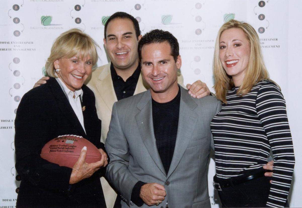 In this January 2001, photo Phyllis Apple, left, CEO and founder of The Apple Organization PR, is with David Canter, president and founder of Total Entertainer and Athlete Management (TEAAM). Richard Newman, Chairman of TEAAM and Valerie Zucker, president of The Apple Organization. TEAAM was a client and had entered into an alliance with the public relations firm in which The Apple Organization offered public relations services to TEAAM’s NFL clients that included players from the Miami Dolphins, Washington Redskins, Dallas Cowboys and others.