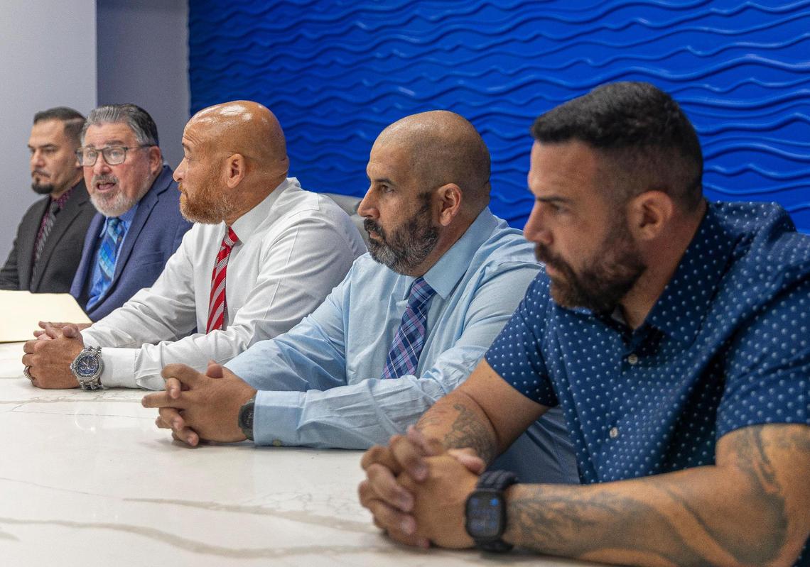 From left: Miami Gardens police officer Rudy Hernandez, attorney Michael Pizzi Jr., Sgt. Pedro Valdes, and officers Francisco Mejido and Juan Gonzalez say were targets of racial discrimination by the Miami Gardens police department. They filed complaints with the federal Equal Opportunity Commission and are calling for the removal of Police Chief Delma Noel-Pratt, Wednesday, July 16, 2025, in Miami Lakes, Florida.