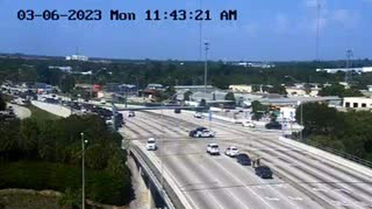 A traffic camera view of the crash involving a Miami-Dade police cruiser and another vehicle at the Ives Dairy Road exit of Interstate 95.