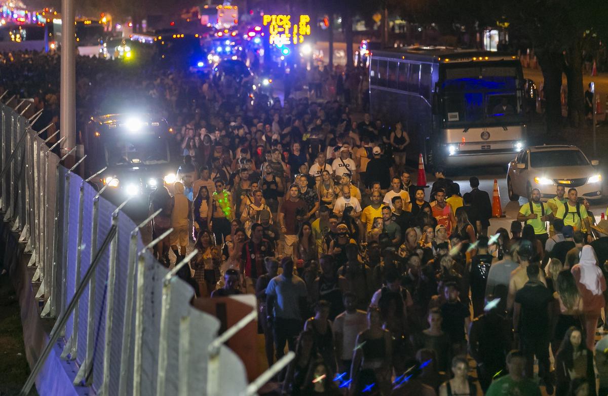Tens of thousands festival goers make their way out of the 2019 Ultra Music Festival in Virginia Key, Florida on Saturday, March 30, 2019.