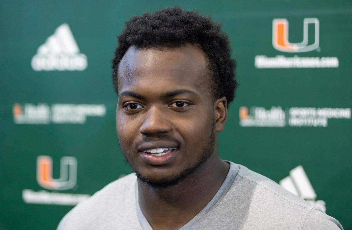 Miami Hurricanes defensive lineman Rueben Bain, Jr. (4) speaks to members of the press after attending team practice inside the Carol Soffer Indoor Practice Facility at the University of Miami on Monday, March 4, 2023 in Coral Gables, Fla.