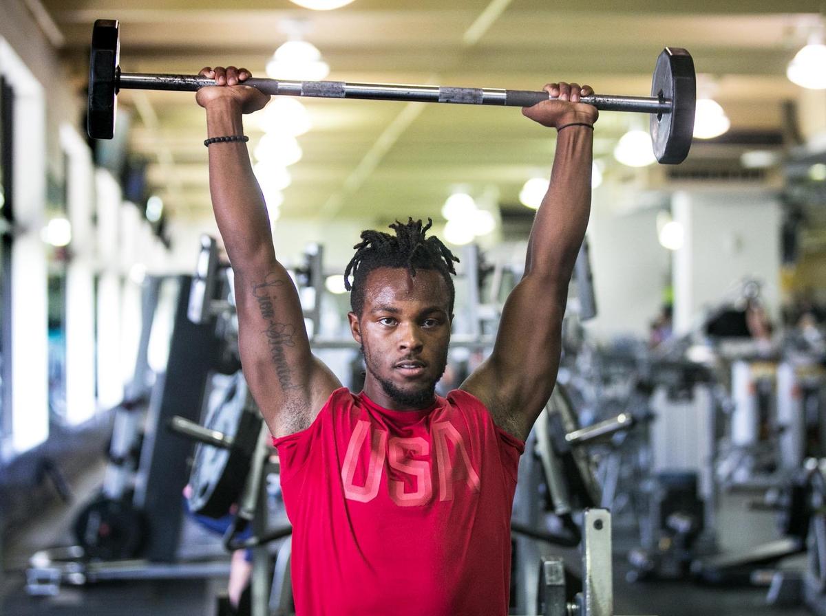 Malik Bryant, a rugby player and rising junior at Florida International University, recently qualified to compete in Denver to be part of TEAM USA. Here he works out with weights at 24 Hour Fitness in Miramar on Aug. 9.