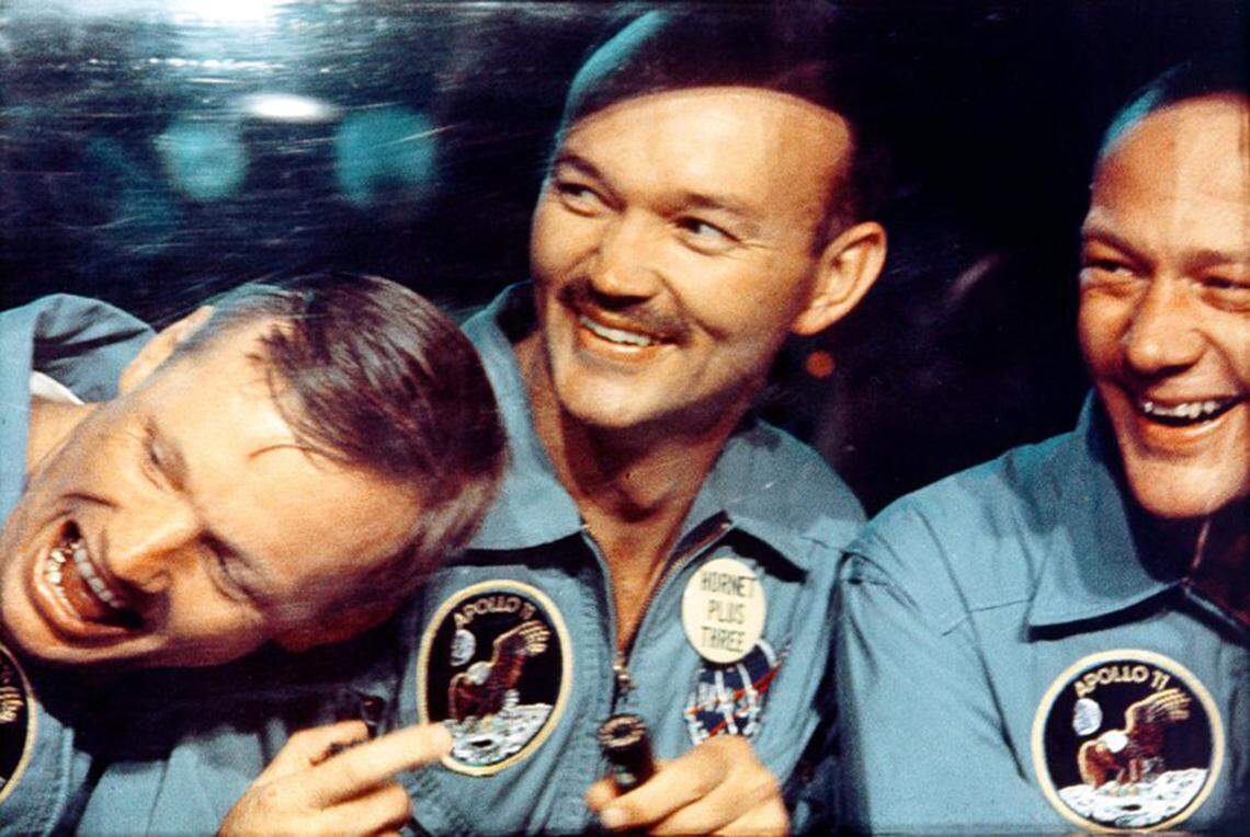 From left to right, Neil Armstrong, Michael Collins and Edwin “Buzz” Aldrin Jr. pose in a candid shot of the Apollo 11 crew on July 24, 1969.