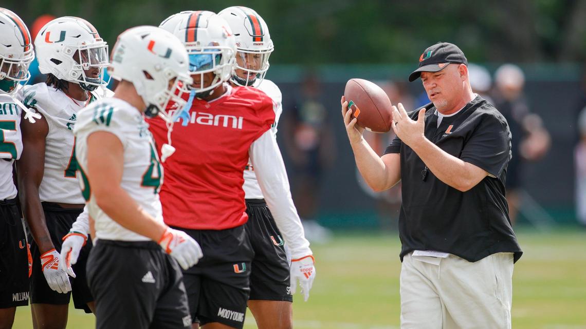 Miami Hurricanes defensive coordinator Lance Guidry talks to his players during spring practice at the University of Miami in Coral Gables, Florida, Saturday, March 4, 2023.