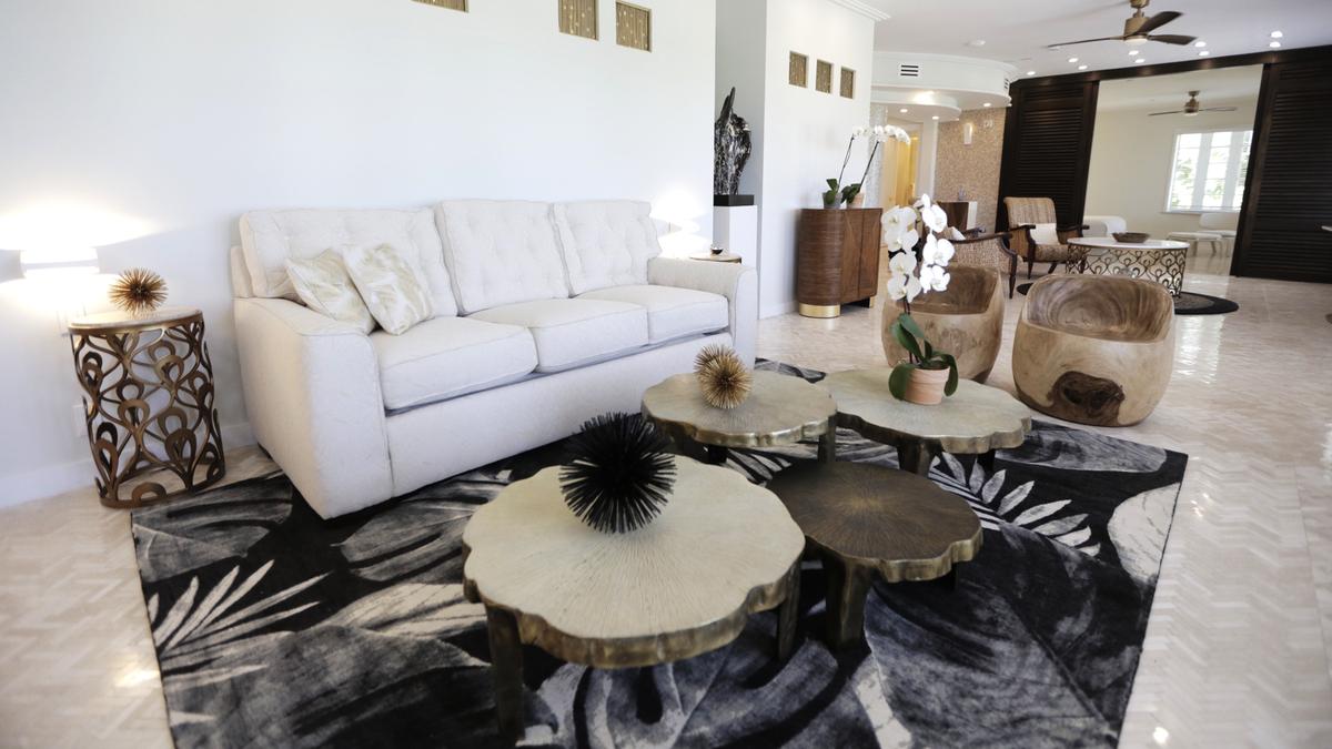 The third floor penthouse suite at the Cardozo Hotel stretches the entire width of the property and looks out over Lummus Park and the ocean beyond.