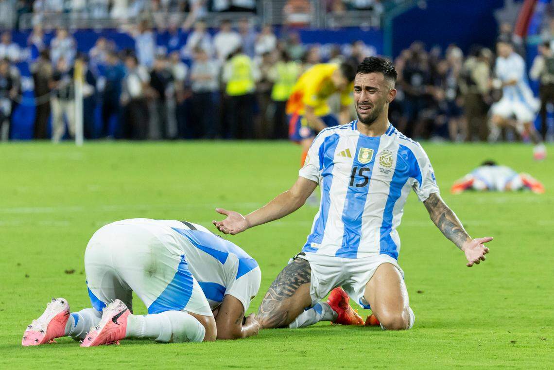 Argentina forwards Nicolás González (15) and Lautaro Martínez (22) react after defeating Colombia in their Copa America 2024 Final soccer match at Hard Rock Stadium on Sunday, July 14, 2024, in Miami Gardens, Fla.