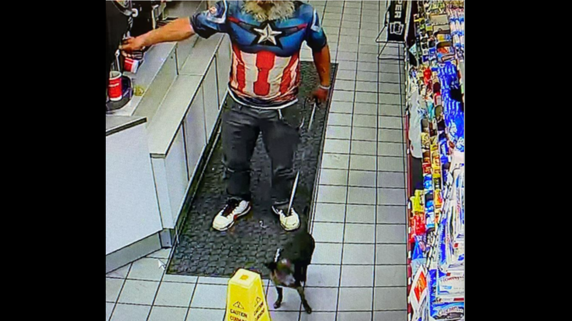 This photo was released by the Many Police Department and shows the suspect and his dog visiting a business before the chase began April 4.