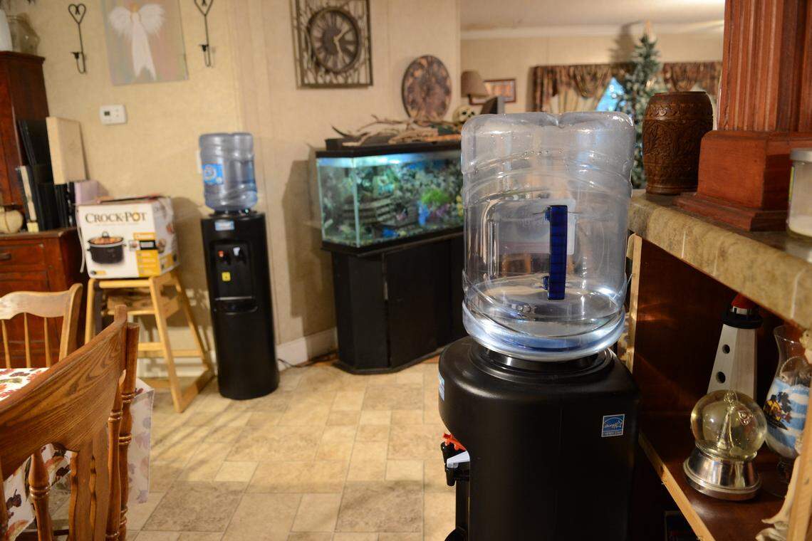 The state’s Department of Health regularly delivers bottled water to Linda Lawson and her family for drinking, cooking, bathing and other household activities. They have also used the water for their five dogs — Jasper, Harley, Tennessee, Bama and Giz — though their aging horse still drinks from the well.