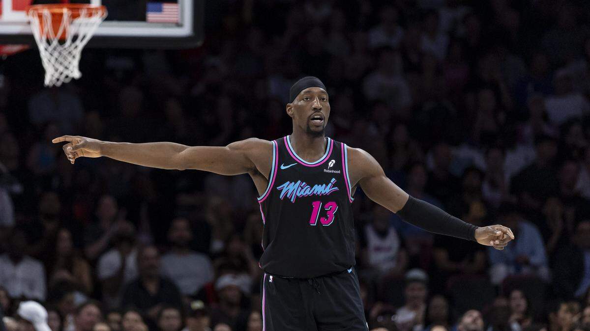 Miami Heat center Bam Adebayo (13) reacts after scoring against the Orlando Magic in the first half of their NBA game at the Kaseya Center on Saturday, March 14, 2026, in downtown Miami, Fla.