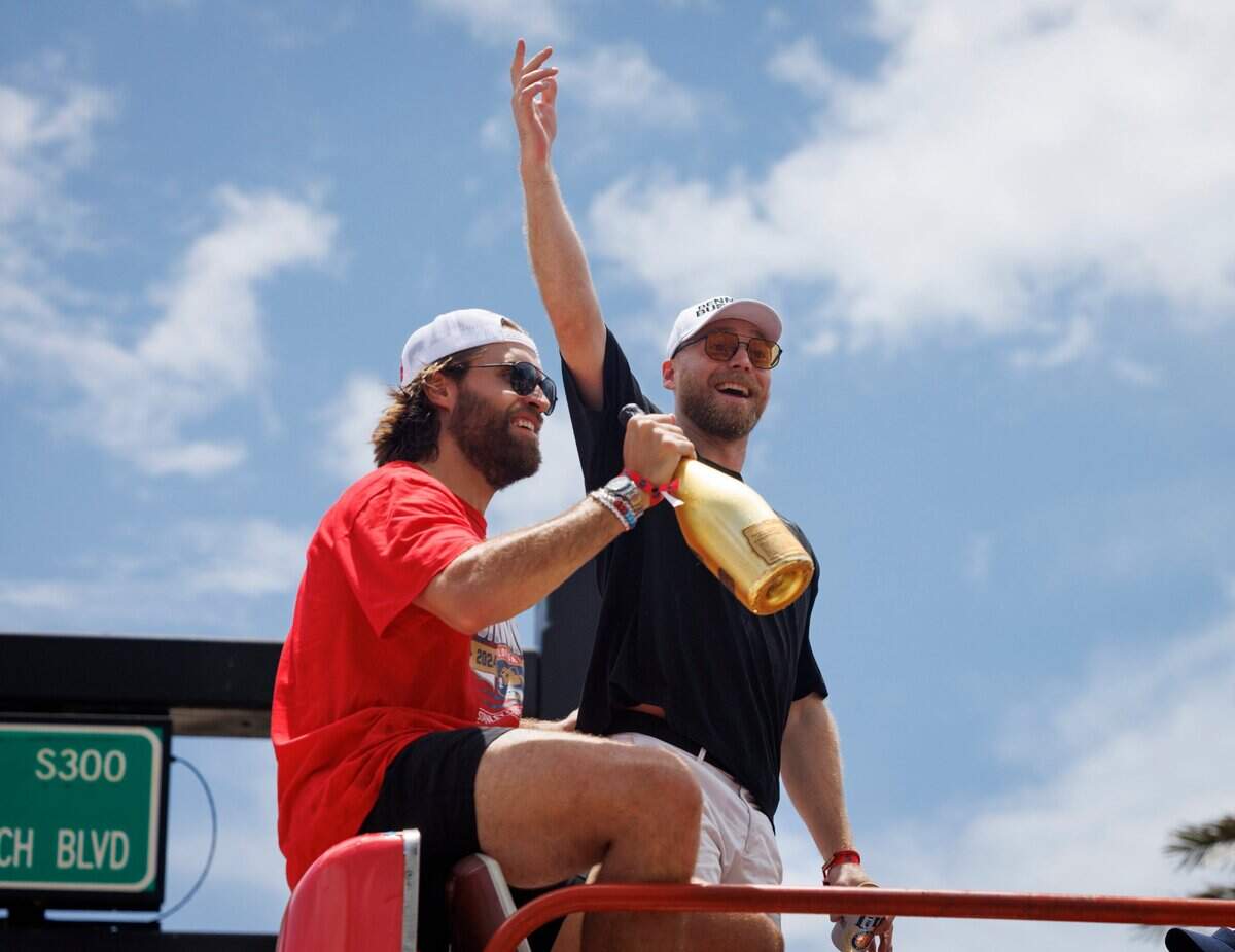 Florida Panthers defenseman Aaron Ekblad (5), left, and center Sam Bennett (9) celebrate during the Florida Panthers Stanley Cup Championship victory parade on Sunday, June 22, 2025, down Las Olas in Fort Lauderdale, Fla.