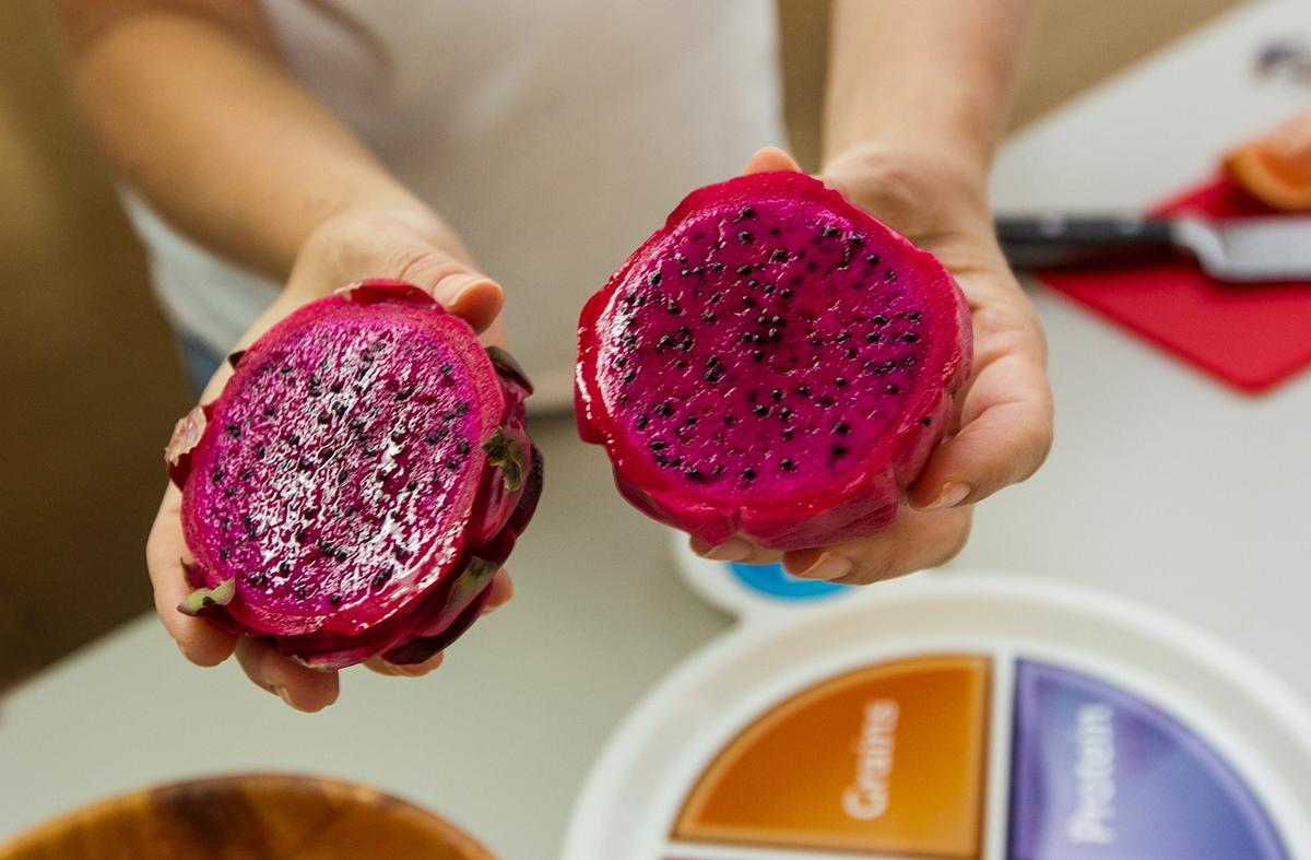 Nicklaus Children's Hospital kicks off a weeklong overnight camp for children with diabetes. Here they show children an example of a Dragon Fruit which aids digestion, boosts the immune system, is rich in antibacterial and antifungal properties and helps improve the rate of metabolism in the body by lowering blood sugars on Monday, July 9, 2018