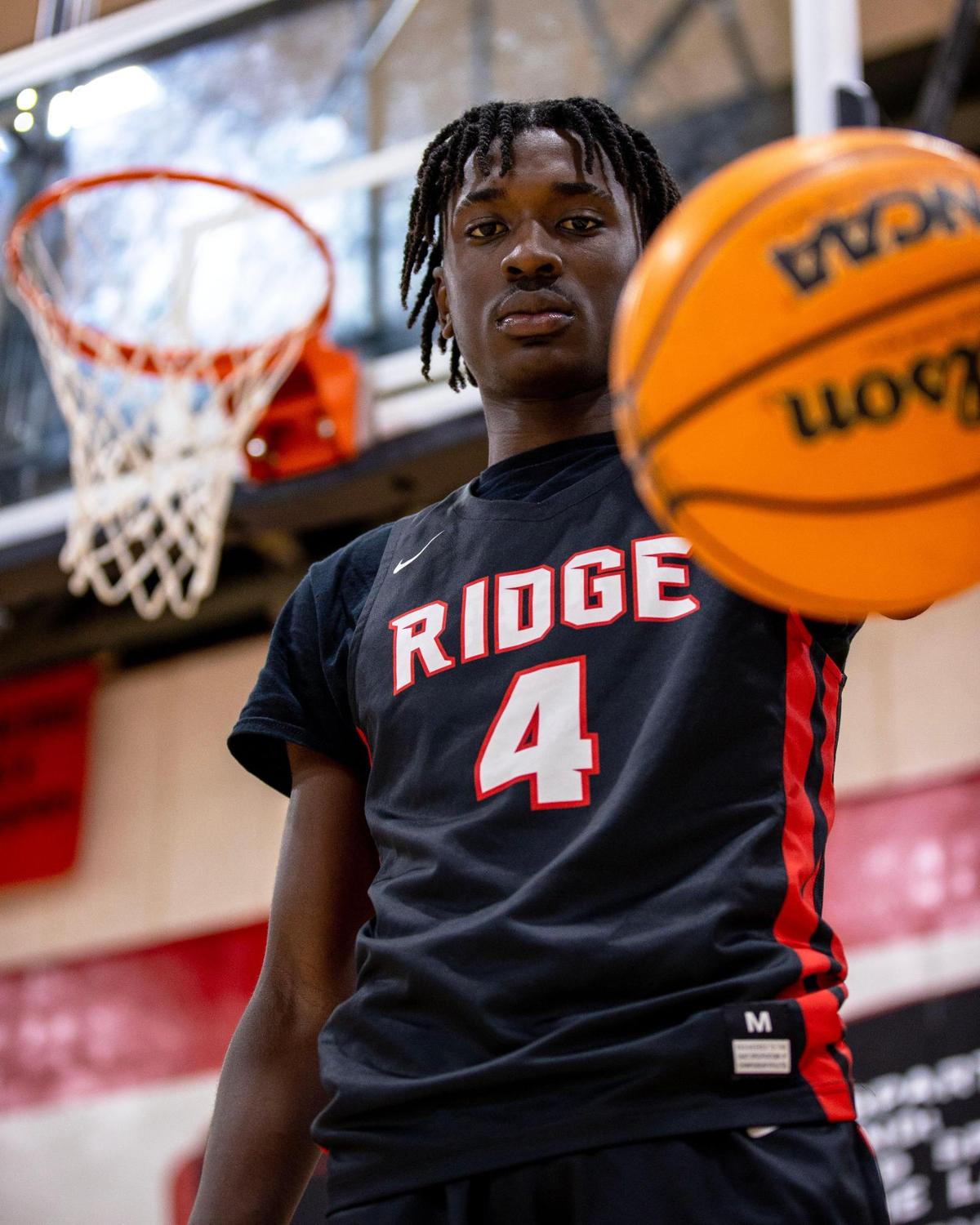 Spartans guard Koree Cotton strikes a pose for a portrait inside the gym at Miami Southridge High in Miami, Florida, on Friday, January 6, 2023.