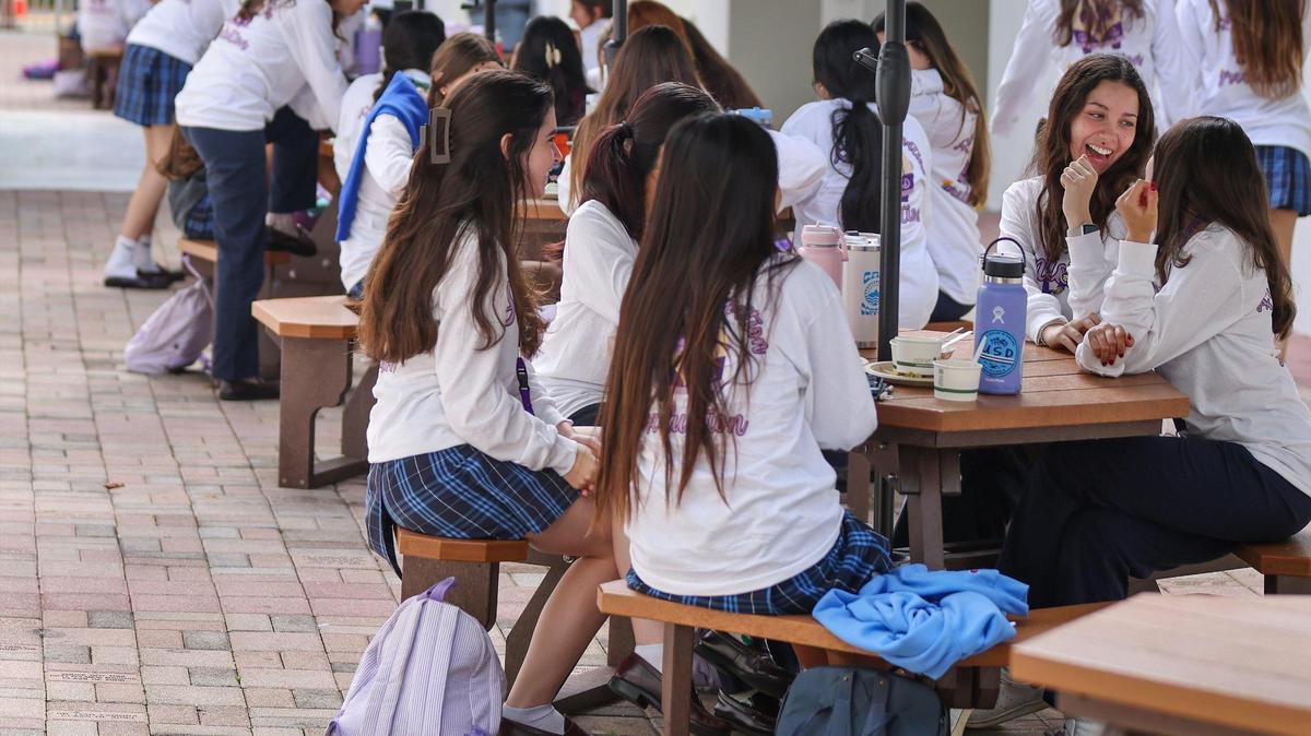 Students at Our Lady of Lourdes Catholic Academy take a lunch break at the prestigious all-girls school in South Miami. 