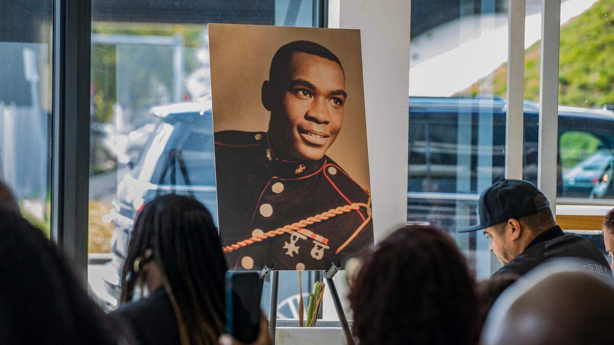 A poster of Arthur McDuffie during a February 2024 ceremony that erected a marker at Northeast 38th Street and North Miami Avenue, the spot where the 33-year-old McDuffie was beaten into a coma by Metro Dade police officers on Dec. 17, 1979. He died in the hospital a few days later.