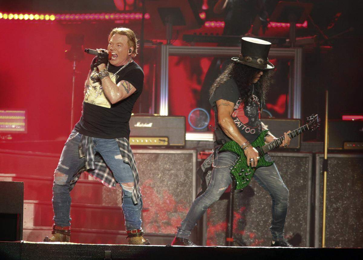 In this Oct. 4, 2019 file photo, Guns N’ Roses’ Axl Rose, left, and Slash perform on the first weekend of the Austin City Limits Music Festival at Zilker Park in Austin, Texas. Guns N’ Roses, Maroon 5, DJ Khaled and DaBaby will perform at the second annual Bud Light Super Bowl Music Fest, to take place Jan. 30 through Feb. 1, 2020, at AmericanAirlines Arena in Miami.