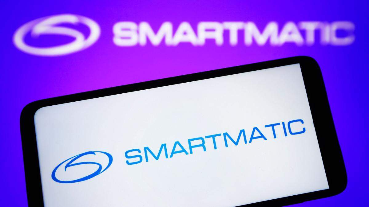 In this photo illustration, a Smartmatic logo is seen on a smartphone and on a pc screen. (Photo by Pavlo Gonchar / SOPA Images/Sipa USA) *** Strictly for editorial news purposes only ***