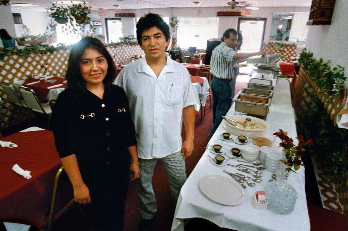 In 1996, Carolina Soto Rios and husband, Miguel Rios, offer a lunch buffet at their Hollywood restaurant International Cafe.