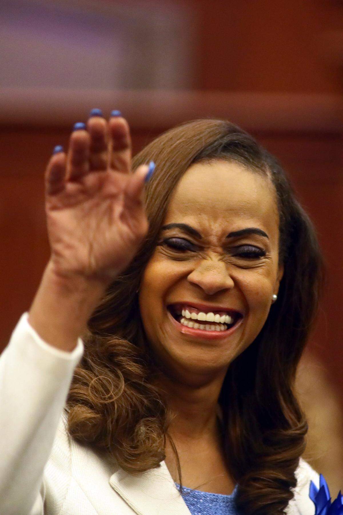 New Sen. Rosalind Osgood, D-Tamarac, waves to friends as she is recognized on the floor of the Senate Tuesday, April 19, 2022, at the Capitol in Tallahassee, Fla.
