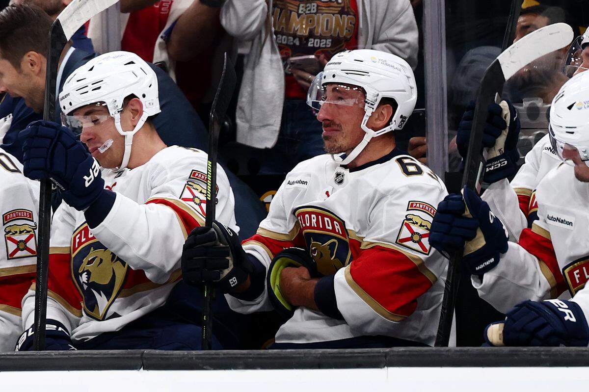 BOSTON, MASSACHUSETTS - OCTOBER 21: Brad Marchand #63 of the Florida Panthers cries as he is recognized by the Boston Bruins, where he played for 16 seasons, during the first period of the game between the Florida Panthers and Boston Bruins at TD Garden on October 21, 2025 in Boston, Massachusetts. (Photo by Maddie Meyer/Getty Images)