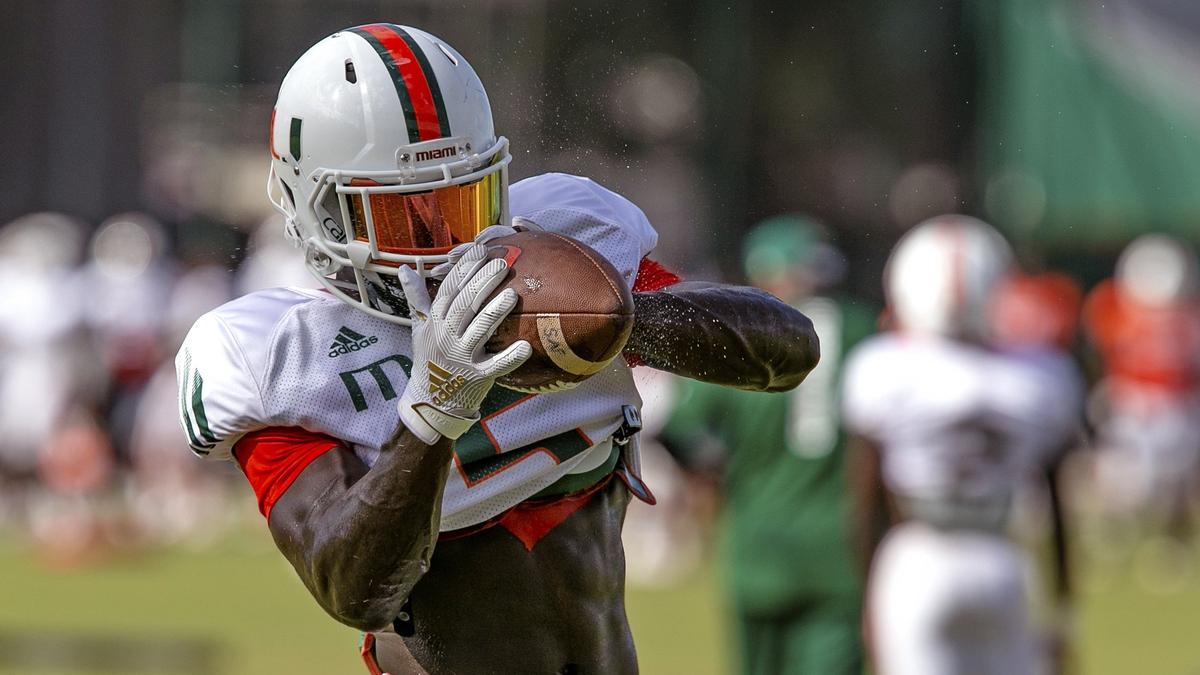 Miami Hurricanes safety Amari Carter (5) catches the ball during practice at the University of Miami Greentree Practice Field in Coral Gables on Wednesday, July 31, 2019.