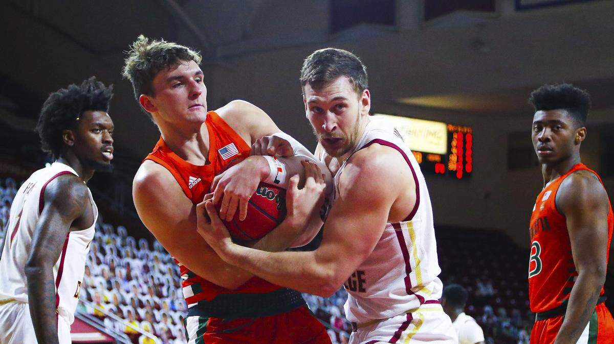 UM freshman Matt Cross (left), a Boston area native, struggled in his homecoming -- as did the rest of the Hurricanes -- and UM lost 84-62 to the Boston College Eagles on Jan. 12, 2021.