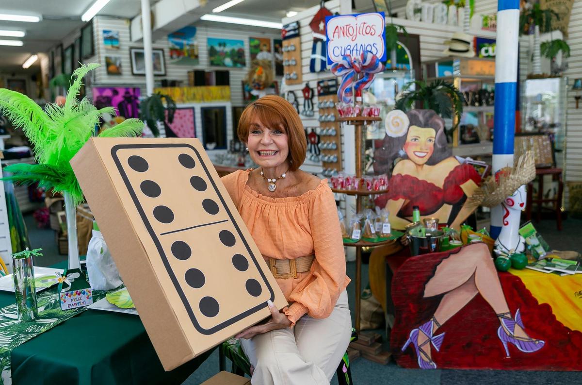 Maria Vazquez, owner of Sentir Cubano, is photographed inside her store in Little Havana on Tuesday, June 28, 2022. She said, ‘People moved to Little Havana over 70 years ago because the rents were cheaper than other neighborhoods in Miami. From there, this area became the hub of Cuban culture in this country.’