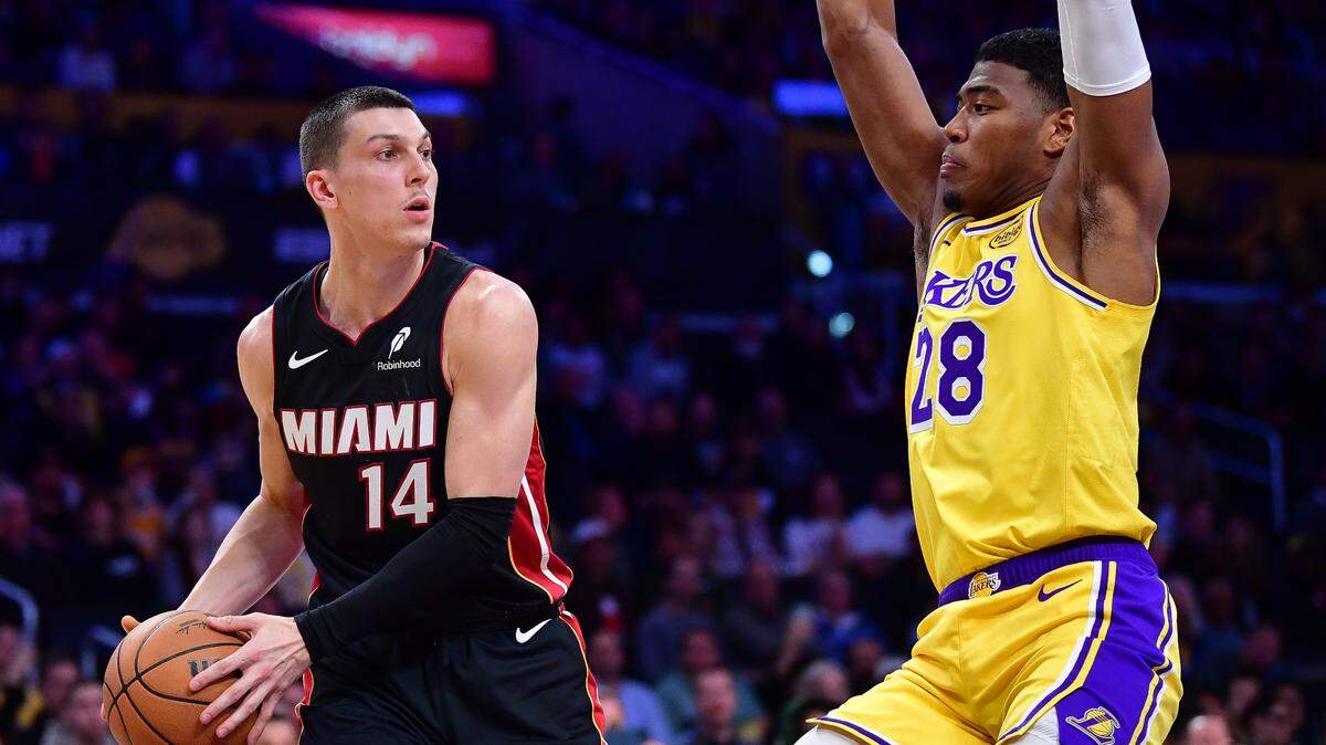 Miami Heat guard Tyler Herro (14) controls the ball against Los Angeles Lakers forward Rui Hachimura (28) during the first half at Crypto.com Arena.