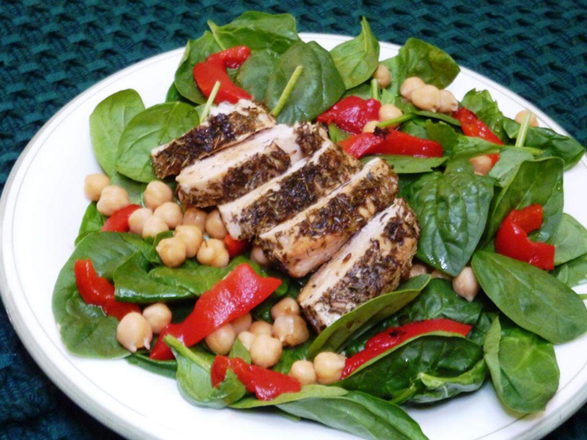 Salads with spinach and grilled chicken and chickpeas makes for an easy and healthy meal. Spinach is one of the best foods you can eat in helping to prevent cancer.
