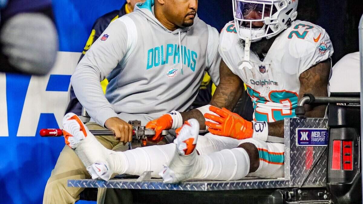 An injured Miami Dolphins running back Jeff Wilson Jr. (23) is carted off during the game against the Los Angeles Chargers in the second quarter at SoFi Stadium in Inglewood, California on Sunday, December 11, 2022.