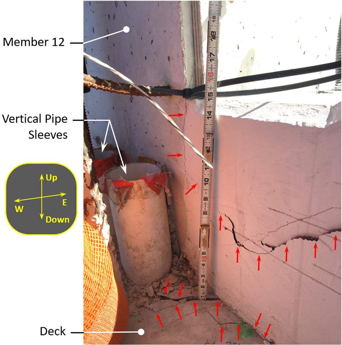 Photograph showing the west face of truss members 11 and 12 where they meet the deck on March 13, 2018, at 11:25 a.m.