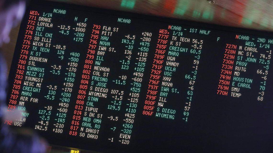 Odds are displayed on a screen at a sports book in Las Vegas. The Supreme Court has overturned a federal law that banned sports books in most states.