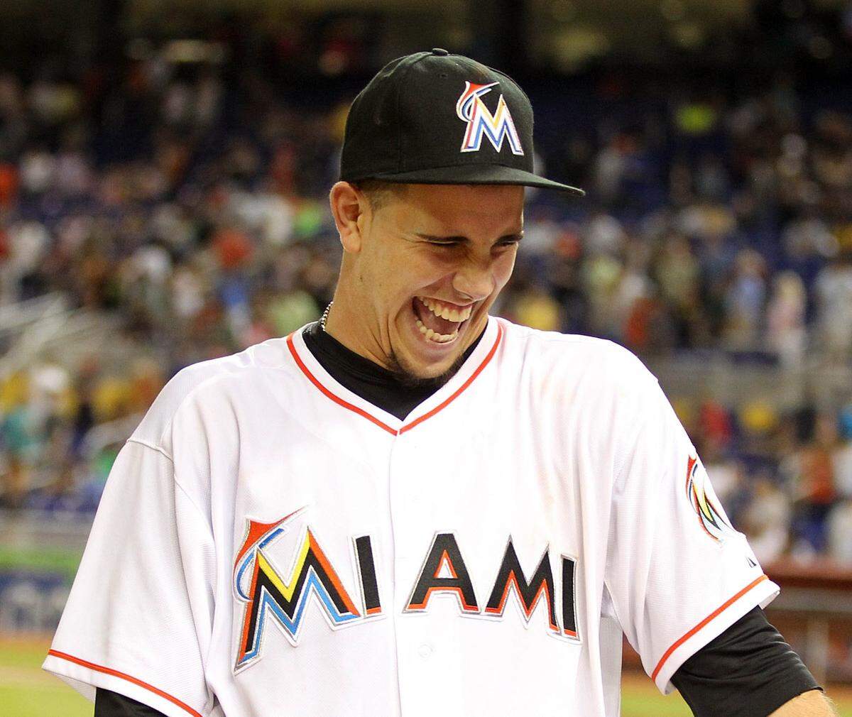 Pitcher Jose Fernandez laughs after the Miami Marlins defeated the Cleveland Indians, 10-0, at Marlins Park in Little Havana in Miami on Friday, Aug. 2, 2013. Fernandez had 14 strikeouts in eight innings.