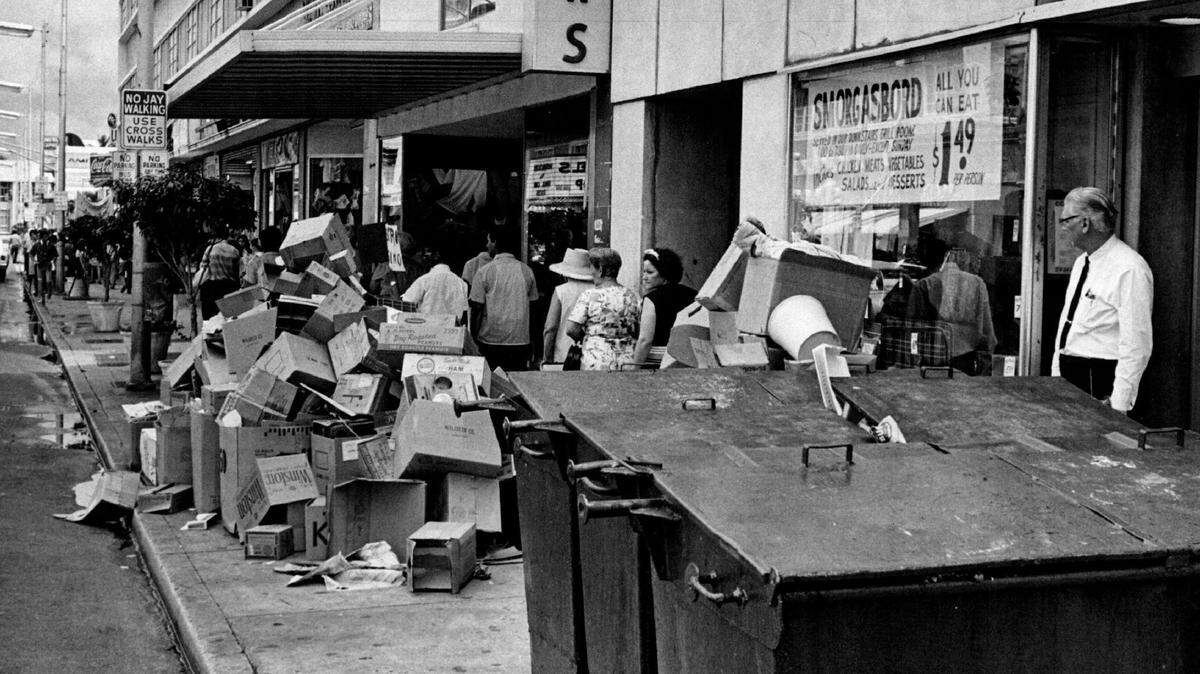 Garbage piles up outside the Walgreens at Flagler Street and Second Avenue in downtown Miami in 1969.