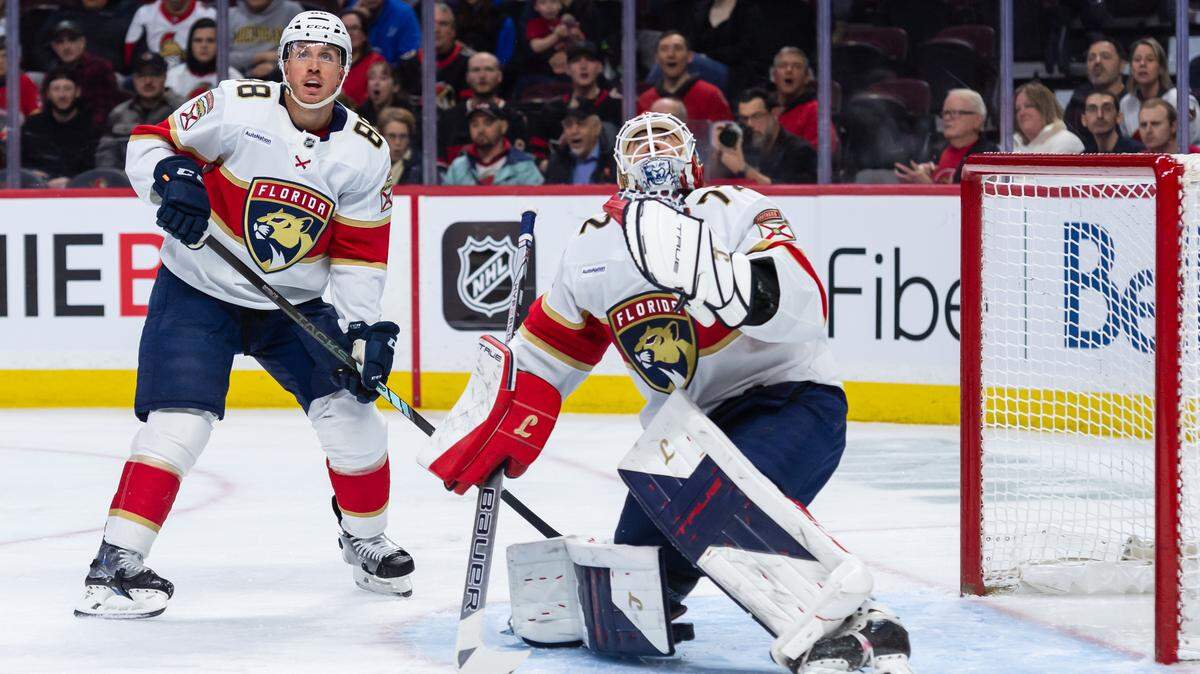 Apr 5, 2025; Ottawa, Ontario, CAN; Florida Panthers defenseman Nate Schmidt (88) and goalie Sergei Bobrovsky (72) follow the puck in the first period against the Ottawa Senators at the Canadian Tire Centre. Mandatory Credit: Marc DesRosiers-Imagn Images