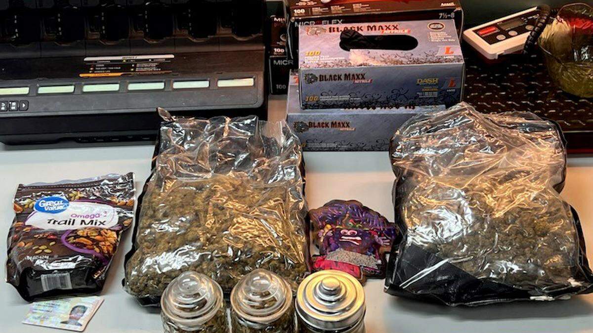 Bags and jars of marijuana are displayed from a Monroe County Sheriff’s Office traffic stop arrest in the Florida Keys Tuesday, May 9, 2023.