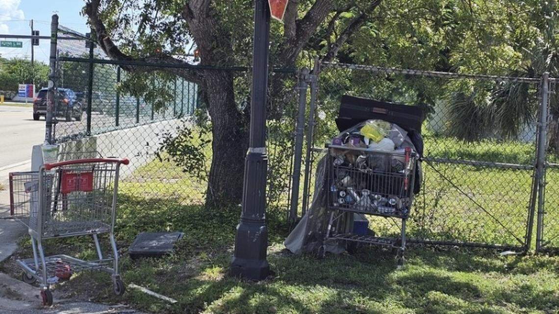 A photo submitted to the FixIt FTL app shows a shopping cart “full of homeless stuff” at an intersection in Fort Lauderdale.