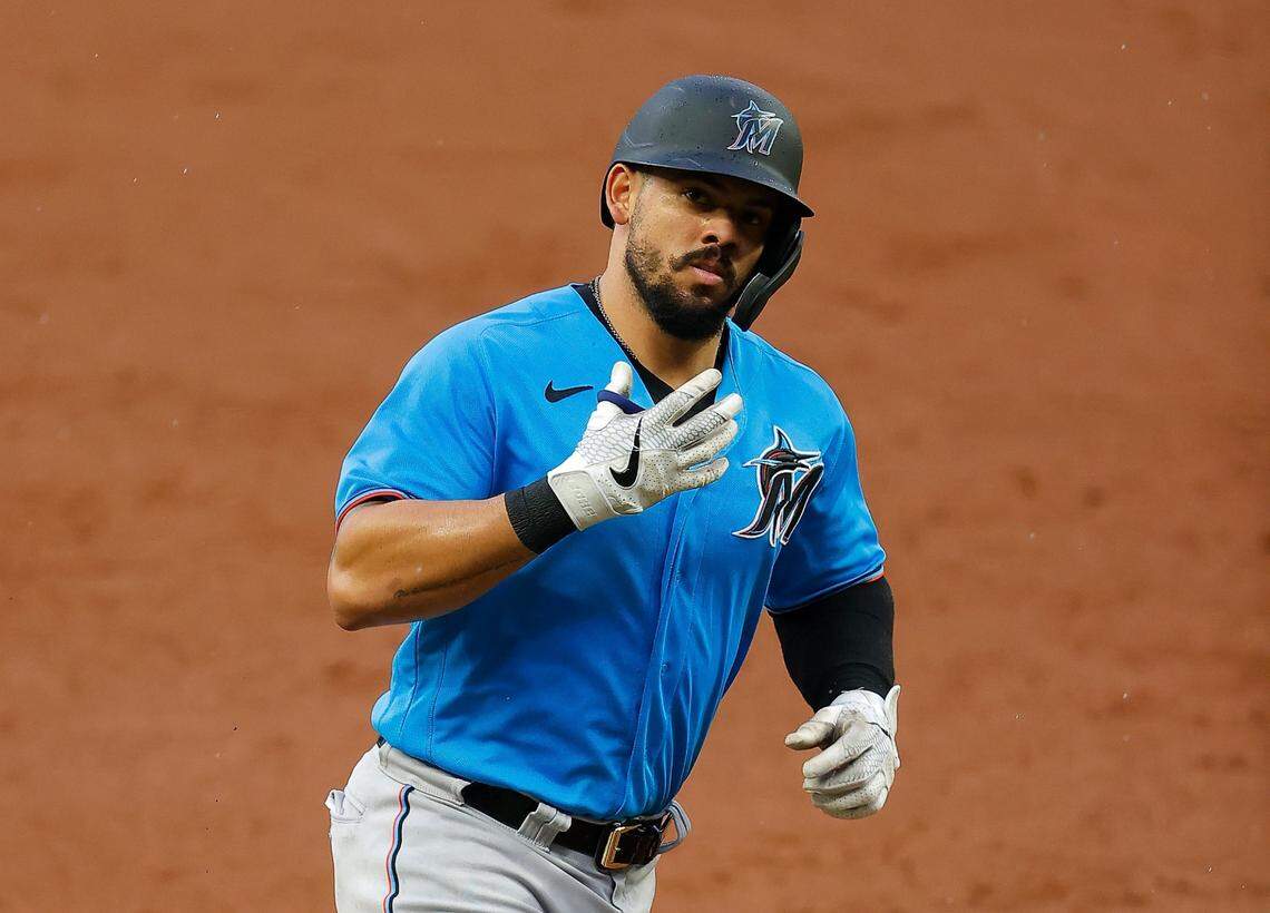 ATLANTA, GEORGIA - JULY 21: Jorge Alfaro #38 of the Miami Marlins reacts as he rounds third base on a solo homer in the third inning against the Atlanta Braves during an exhibition game at Truist Park on July 21, 2020 in Atlanta, Georgia. (Photo by Kevin C. Cox/Getty Images)
