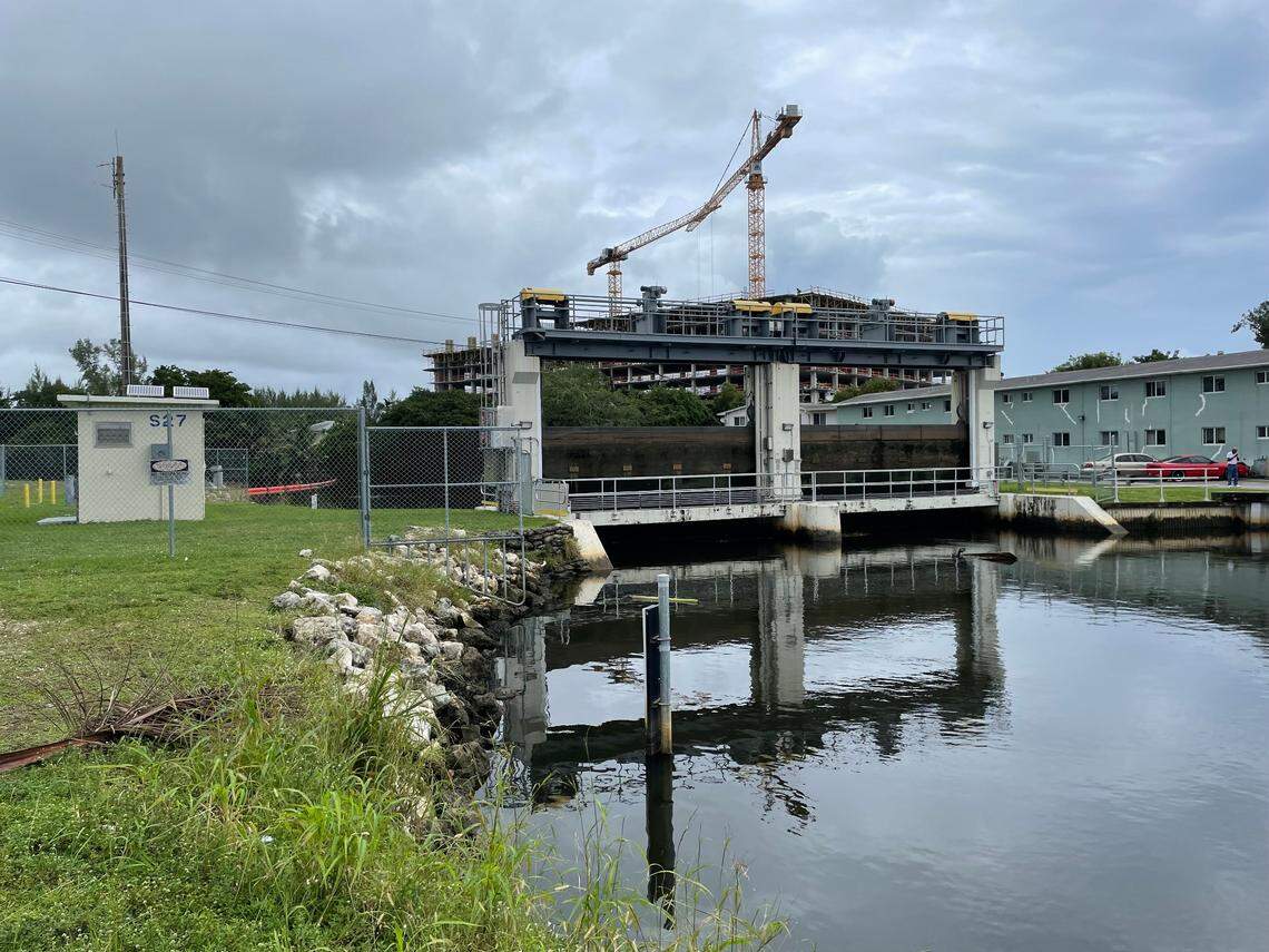 The South Florida Water Management District uses the S-27 floodgate to control the flow of the Little River canal.