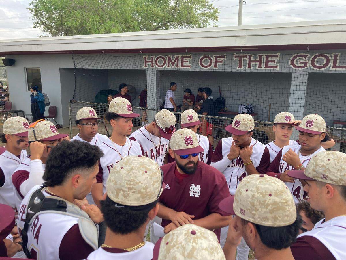 Miami Springs baseball coach David Fanshawe (center) is the Miami Herald’s Class 4A-1A Miami-Dade Coach of the Year.