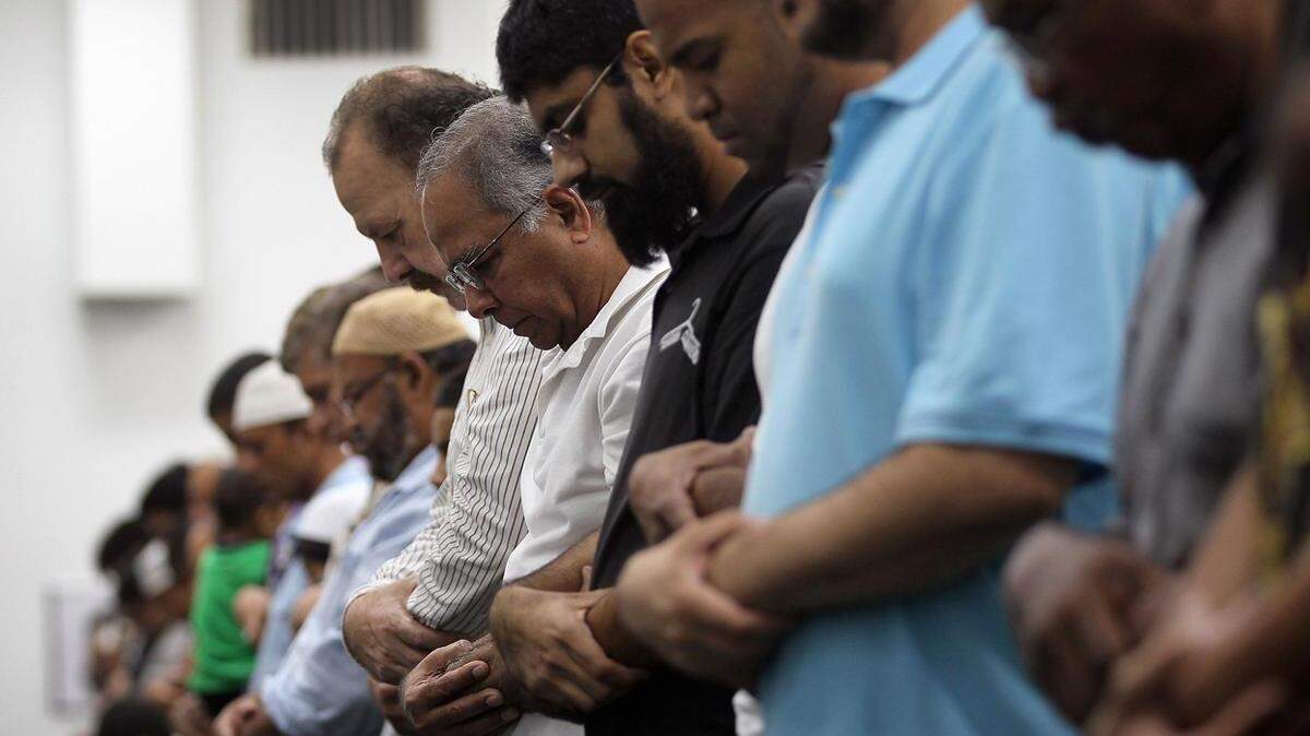 In 2011, Muslims pray on the night of the first day of Ramadan at the Islamic Center of Greater Miami in Miami Gardens.